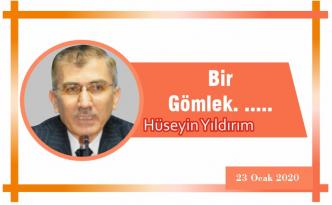 Bir Gömlek. …..